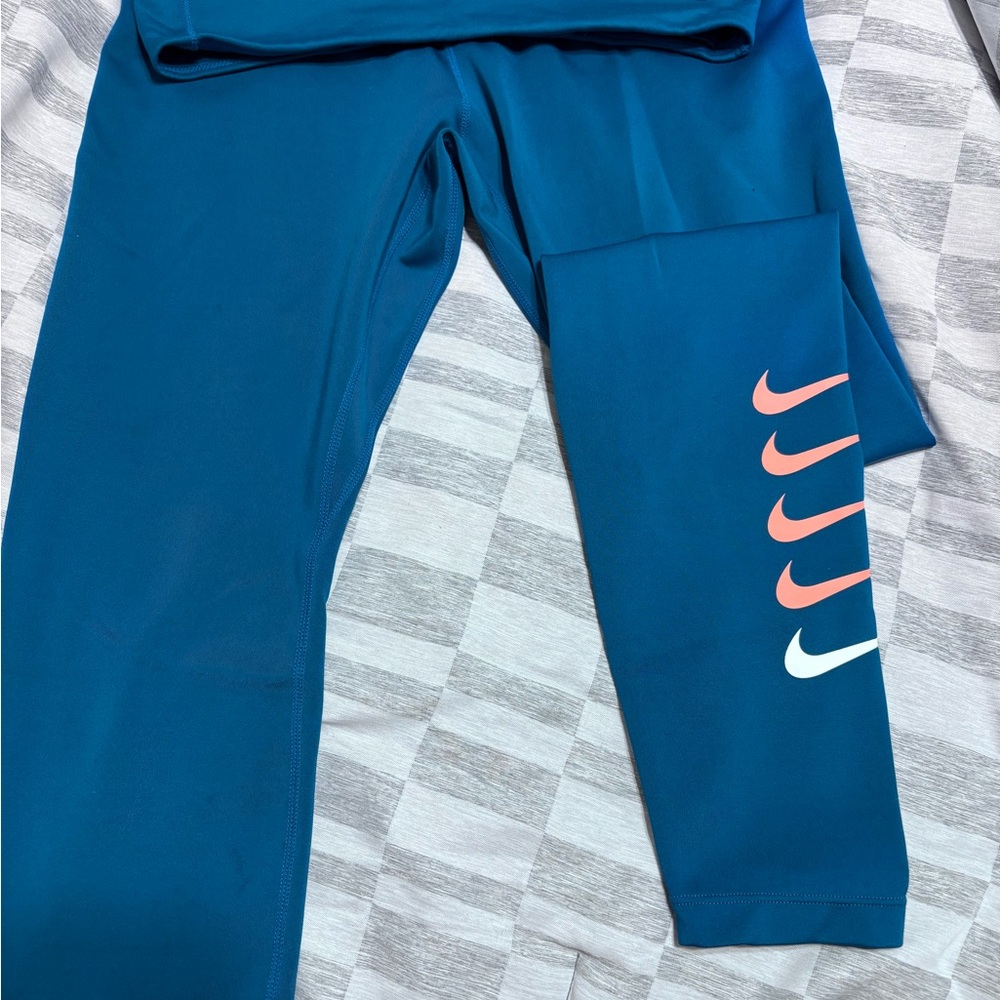 Nike Teal Leggings with Pink and White Swooshes
